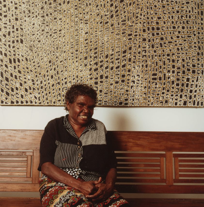 Dorothy Napangardi in front of her painting in 1998.